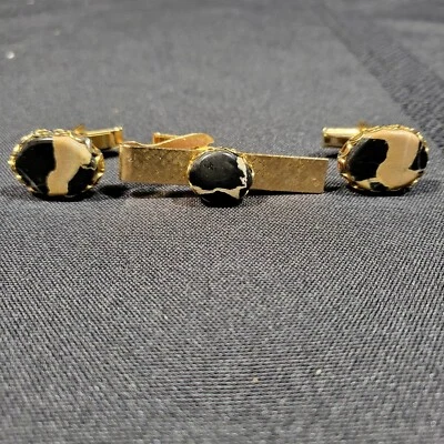 Barra de corbata y gemelos vintage de Polonia dorados con aspecto de mármol negro y tostado Foto 1 de 4