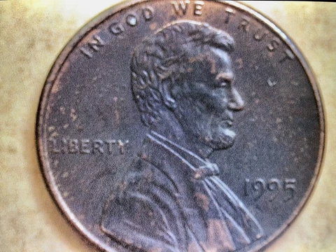 Very, very rare 1995 Penny. Dark Toned Obverse, Shiny Red Reverse Cover