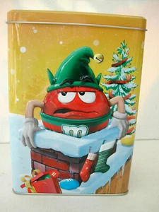 * M&M'S BOÎTE A M&M'S CACAHUETE ROUGE DANS LA CHEMINEE 13 x 18 x 8 cm - Imagen 1 de 1
