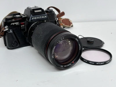 Pentax program A 35mm SLR. Tokina 35-200mm f1.4-5.6 Lens. Hoya 62mm Filter. Bag. - Image 1 of 4