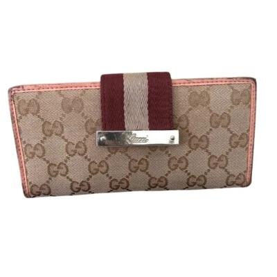 Cartera Gucci marrón y rosa con diseño icónico Foto 1 de 4