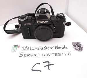 NEAR PEREFCT Canon AE-1 RARE BLACK  35mm Film SLR  Professionally Serviced - Picture 1 of 8