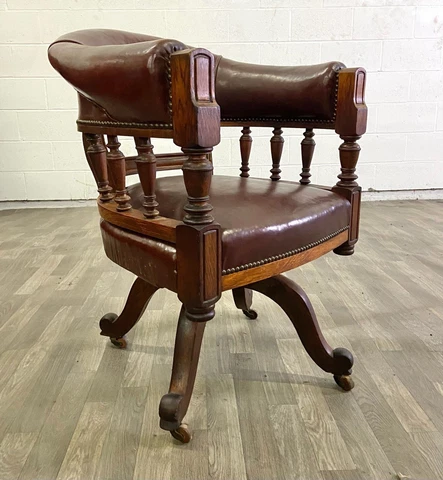 Antique William IV Style Oak and Leather Swivel Captain Chair on Casters Cover