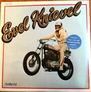 SCHÖN VERSIEGELT EVEL KNIEVEL LP US AMHERST 1974 VINYL mit SIGNIERTER FARBFOTOEINSATZ! - Bild 1 von 2