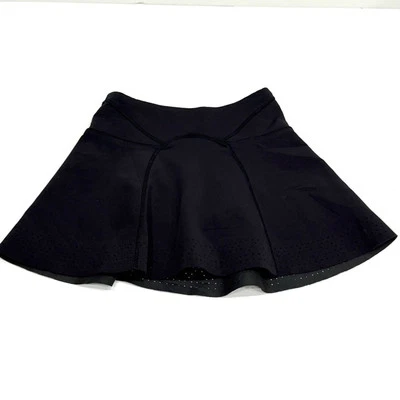 Falda corta circular de neopreno Ivivva By LULULEMON detalle láser niñas talla 10 negra Foto 1 de 4