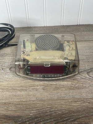 Vintage 2004 jWIN Model No. JL-204C AM/FM Clear Plastic Alarm Clock Radio - Image 1 of 4
