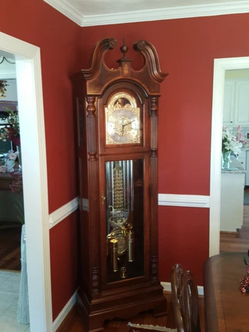 Pre owned Howard Miller grandfather clock Cover