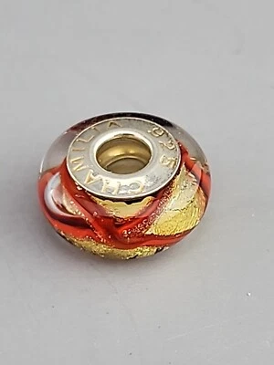 Auténtico abalorio de vidrio de Murano Chamilia - amarillo, remolinos rojos Foto 1 de 3