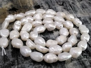 Perla de agua dulce cultivada Nat, grado AA, 6,5-9x5,5-6,5 mm, dos lados pulidos. - Imagen 1 de 4