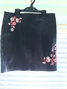 La Redoute Faux Leather mini skirt with flower details on front. - Picture 1 of 2