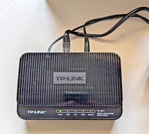 TP-Link TD-8817 ADSL2+ Ethernet/USB Modem Router - Photo 1/4
