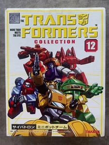 G1 Takara Trafo Buch Neuauflage Sammlung 12 TFC 12 Minibots neu im Karton versiegelt - Bild 1 von 12