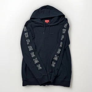 SUPREME TOP CON CAPUCHA MANGA LARGA RAYAS FW2016 Negro M Logo en la manga Peso ligero - Imagen 1 de 12