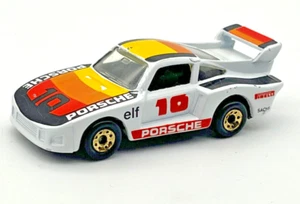 Matchbox MB 41 983 Racing Porsche 935 Elf #10 Bianco Pirelli Sachs quasi nuovo in scatola PVC - Foto 1 di 6
