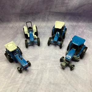 LOT OF 4 ERTL 1/64 Scale FORD New Holland TRACTORS TW35, 7840, 8870, 7740 - Picture 1 of 6