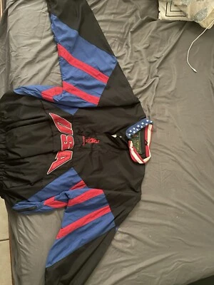 Chaqueta cortavientos olímpica vintage 1996 Atlanta Team EE. UU. Starter Stars bandera XL Foto 1 de 3