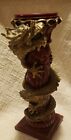 COILED DRAGON ON WOOD CANDLE STAND. DEEP RED AND GOLD