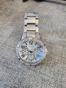 GUESS BEDAZZLED MULTIFUNCTION WOMEN'S WATCH W1097L1 PRE-OWNED SILVER. NEW BATTE - Picture 1 of 9