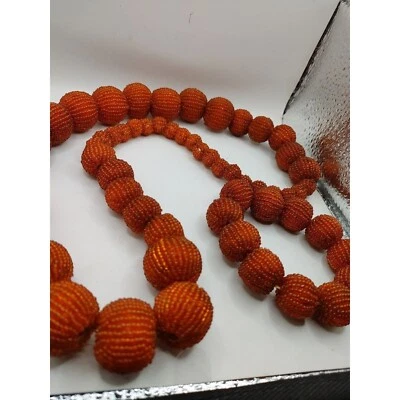 Juego de pulsera y collar naranja. Bolas elásticas con cuentas de vidrio Foto 1 de 4