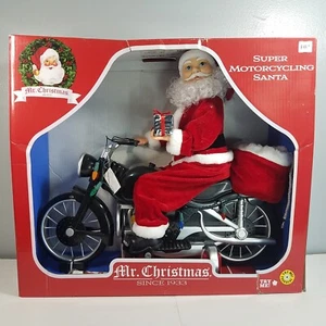 Mr. Christmas Super Motociclismo Santa 24 Villancicos Luces Sonidos 20" - Imagen 1 de 12