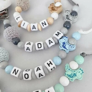 Schnullerkette Mit Namen süßer Dino Dinosaurier mehrere Modelle Baby Geschenenk - Bild 1 von 11
