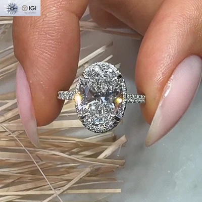Anillo de compromiso de diamantes cultivados en laboratorio de corte ovalado IGI 3,00 quilates E VVS2 en oro blanco de 14 k Foto 1 de 4