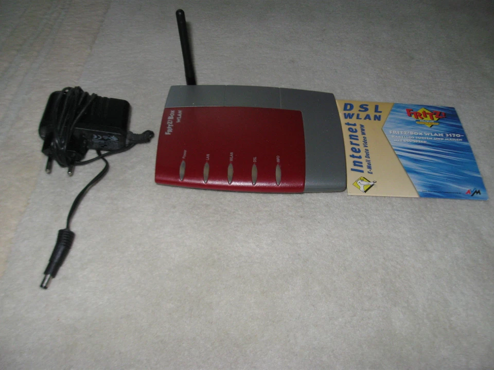 AVM Box WLAN 3170 125 Mbps 4-Port 100 Mbps Funk Router (20002438) CD u. Netzwerk - Bild 1 von 1