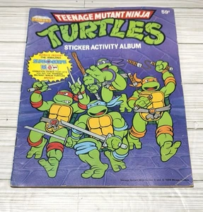 Álbum de actividades adhesivas vintage de Teenage Mutant Ninja Turtles 1989 PANINI - A14 - Imagen 1 de 5