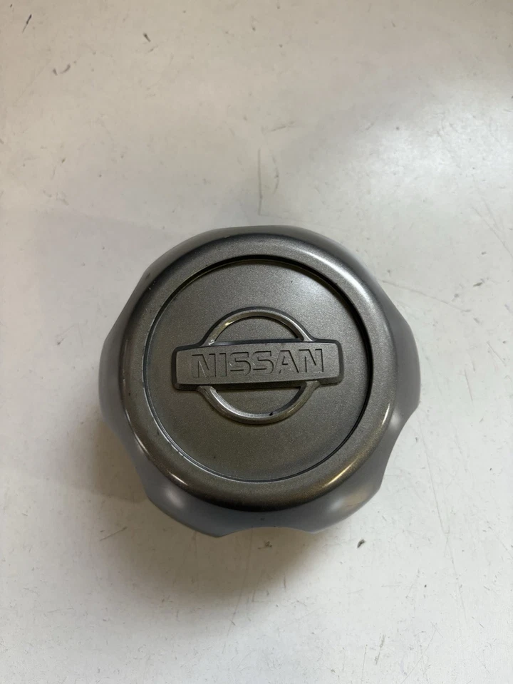 Nissan Frontier Xterra 1998-2004 plateado tapa central buje 40315-7Z100 #62441 Foto 1 de 2