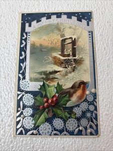 Tarjeta postal dividida c1910 A Happy Christmas tarjeta de Navidad en relieve - Imagen 1 de 2