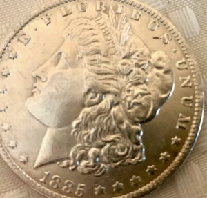 1885 $1 Morgan Silver Dollar - Picture 1 of 2