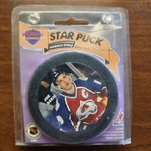 JOE SAKIC Star Photo Puck hockey puck NHL COLORADO AVALANCHE picture  - Picture 1 of 2