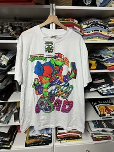 T-shirt promozionale TMNT vintage 1990 adolescenti mutanti tartarughe ninja Michelangelo ruota nuova - Foto 1 di 7