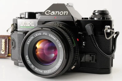 Canon AE-1 Program 35mm Black SLR New FD 50mm f1.8【N.MINT w/Strap】JAPAN #151 - Immagine 1 di 4