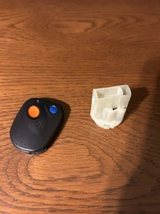 BMW E36 Keyless Entry Fob Along With Rear Tail Light Housing For Parts Or Repair - Picture 1 of 5