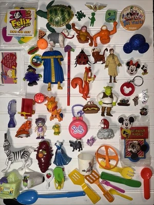Lote de juguetes mixtos. Tokidoki, Disney, Polly Pocket, Strawberry Shortcake, Rugrats, etc. Foto 1 de 4