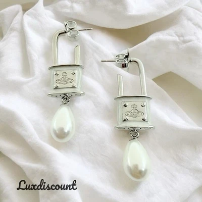 Vivienne Westwood Silver Lock Pearl Dangle Earrings. - Image 1 of 3