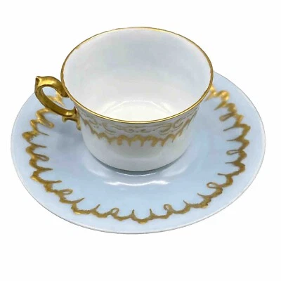 Antigua taza y platillo de café espresso Elite Limoges elevado dorado remolino azul pálido c1890 Foto 1 de 4