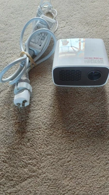 LG PH150 Wireless LCOS LED Movie Projector (White) - HDMI, USB, Aux, ScreenShare - Image 1 of 2