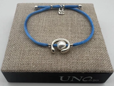 NUEVO Uno de 50 SER DIFERENTE Plateado Hilo Azul Pulsera Shell Perla Foto 1 de 4