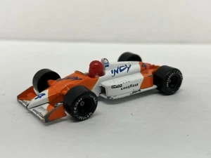 IMS/CART 1988 Indy 500 Racer #4 Matchbox escala 1:55 fundido a presión usado (ala faltante) - Imagen 1 de 9