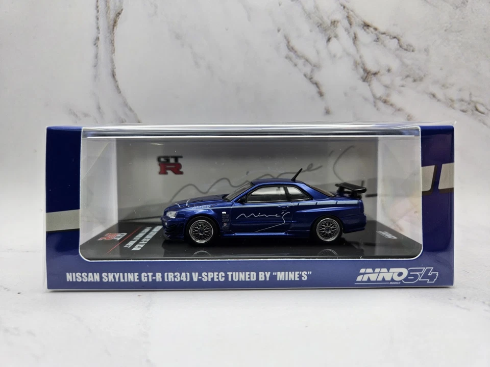 1/64 INNO INNO64 Nissan Skyline GTR R34 V-Spec Tuned MINES IN64-R34VS-MINES-BL - Image 1 of 1