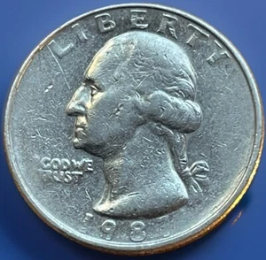 1987-P Washington Quarter Error. Struck Through Grease IGWT on Obverse. WQ-030 - Picture 1 of 6