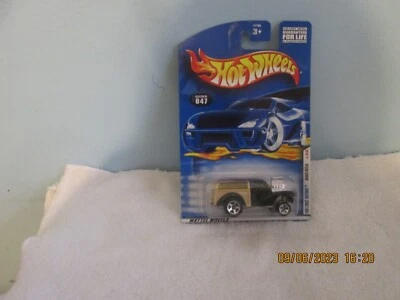 2001 HOT WHEELS ПЕРВОЕ ИЗДАНИЕ УНИВЕРСАЛ MORRIS ЧЕРНЫЙ/КОРИЧНЕВЫЙ 35/36 #047 (B20) - Изображение 1 из 4