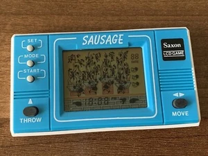 Mini juego y reloj LCD arcade 737 salchicha (sajonia) (A) - Imagen 1 de 9