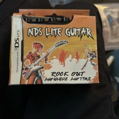 Pega NDS Lite guitar Rock Out Guitar Grip Attachment Controller - Image 1 of 4