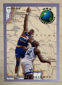 DIKEMBE MUTOMBO - 1993-94 Fleer NBA INTERNATIONALS #7 - DENVER NUGGETS - Picture 1 of 2