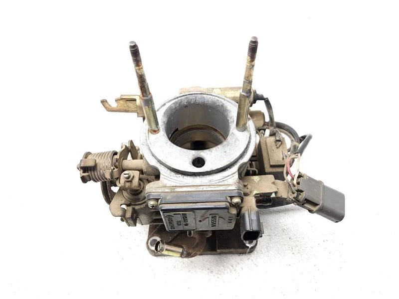 1991 1992 1993 Nissan Pickup corpo do acelerador 4 cilindros através de 3/92 fabricante de equipamento original 1611986G11 - Imagem 1 de 4