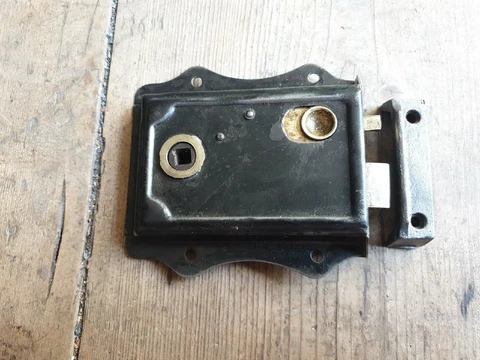 Old/vintage door rim lock & keep Cover