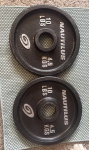 "Placas de peso olímpicas Nautilus de 10 libras, par-2 placas 20 libras en total raras 2"" 10 X 2" - Imagen 1 de 14